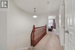 Hallway at top of stairs. - 