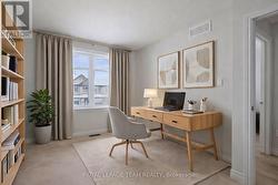 Bedroom has been virtually staged as a home office - 
