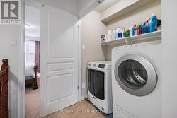 Laundry & storage on upper level - 