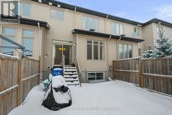 Patio doors lead to fully fenced yard. - 