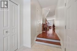 Inside entry from Garage & 2pc Bath in Foyer. - 