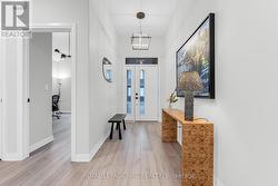 Bright and airy foyer with 10 ft ceiling - 