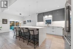 Stunning custom kitchen with quartz counters - 