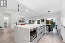 Plenty of workspace on the oversized island. - 