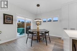 Large dining area with access to the private deck - 