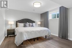 Large third bedroom with custom window coverings - 