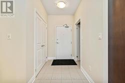 Foyer with storage space & access to laundry room - 