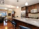 103-32 Waterfront Place, Whitehorse, YT  - Indoor Photo Showing Kitchen With Double Sink With Upgraded Kitchen 