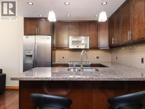 103-32 Waterfront Place, Whitehorse, YT - Indoor Photo Showing Kitchen With Double Sink With Upgraded Kitchen