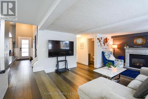 39 Endeavour Drive, Cambridge, ON - Indoor Photo Showing Living Room With Fireplace