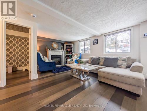 39 Endeavour Drive, Cambridge, ON - Indoor Photo Showing Living Room With Fireplace