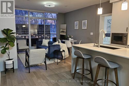 105 - 1575 Lakeshore Road W, Mississauga, ON - Indoor With Fireplace