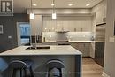 105 - 1575 Lakeshore Road W, Mississauga, ON  - Indoor Photo Showing Kitchen With Upgraded Kitchen 