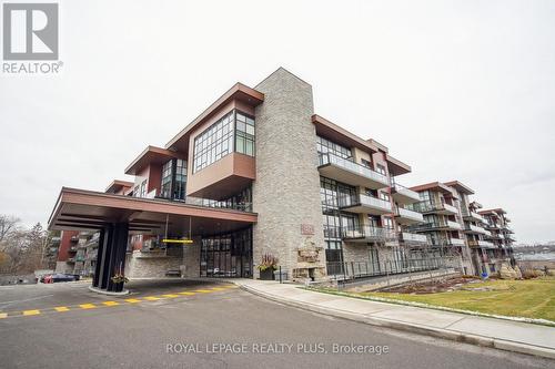 105 - 1575 Lakeshore Road W, Mississauga, ON - Outdoor With Balcony With Facade