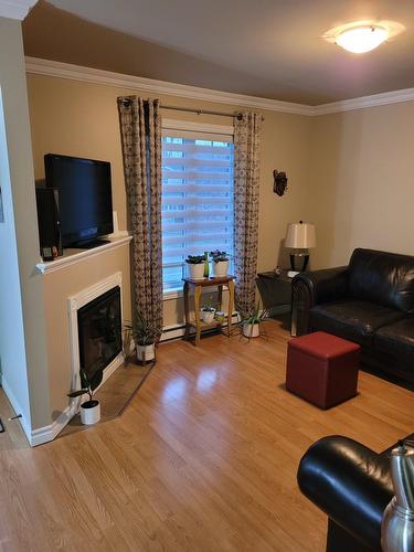 Salon - 440  - 446 Boul. St-Charles, Drummondville, QC - Indoor Photo Showing Living Room With Fireplace
