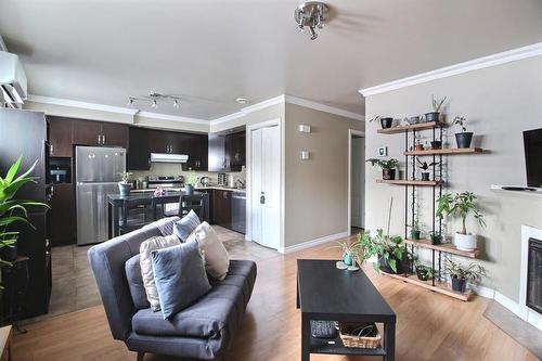 Salon - 440  - 446 Boul. St-Charles, Drummondville, QC - Indoor Photo Showing Living Room With Fireplace