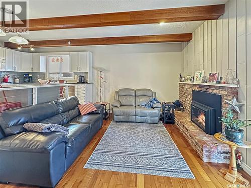 19 Marquis Crescent, Regina, SK - Indoor Photo Showing Living Room With Fireplace