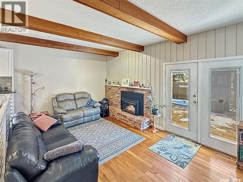 19 Marquis Crescent, Regina, SK - Indoor Photo Showing Living Room With Fireplace