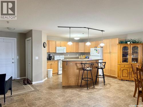 107 6345 Rochdale Boulevard, Regina, SK - Indoor Photo Showing Kitchen