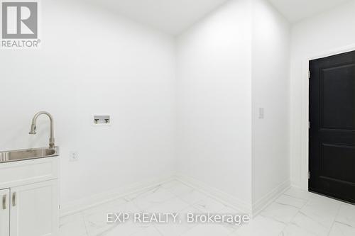 Mudroom w/ combo laundry room, access to garage - 49 Beaufort Crescent, Tiny, ON - Indoor Photo Showing Other Room