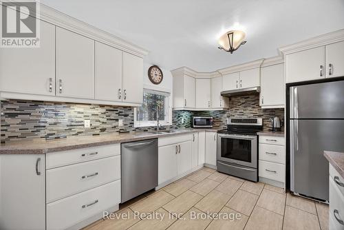 144 Trout Lane, Tiny, ON - Indoor Photo Showing Kitchen With Double Sink
