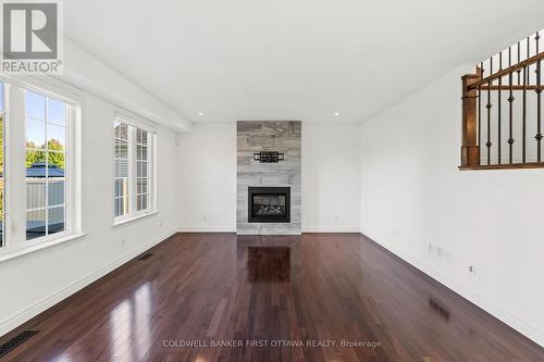 441 Blackleaf Drive, Ottawa, ON - Indoor Photo Showing Living Room With Fireplace