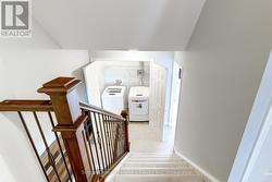 Laundry outside of primary suite - 