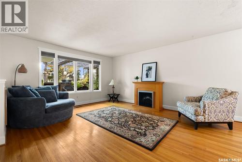3304 Hill Avenue, Regina, SK - Indoor Photo Showing Living Room With Fireplace