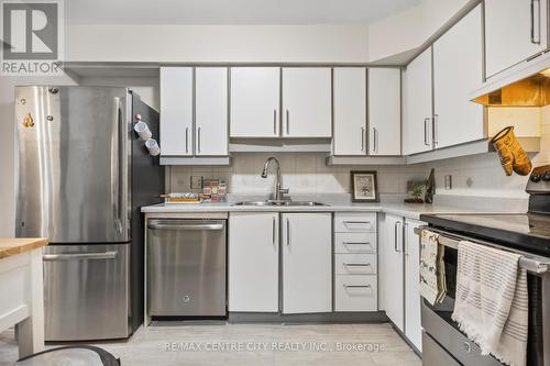 58 - 1199 Hamilton Road, London East (East P), ON - Indoor Photo Showing Kitchen With Double Sink