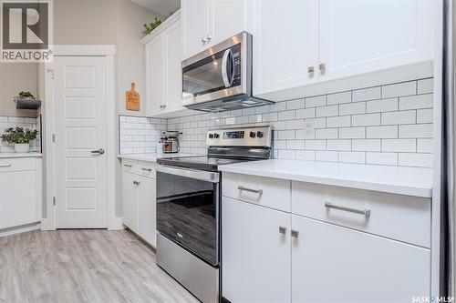 809 Weir Crescent, Warman, SK - Indoor Photo Showing Kitchen With Upgraded Kitchen