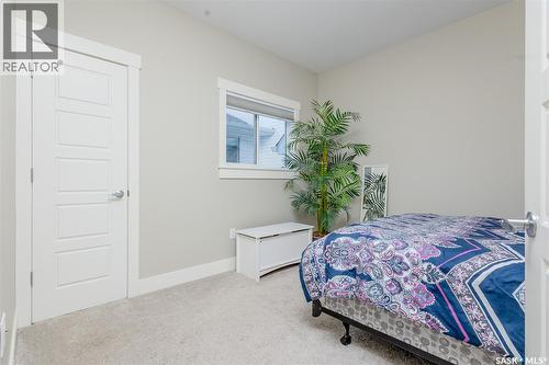 809 Weir Crescent, Warman, SK - Indoor Photo Showing Bedroom