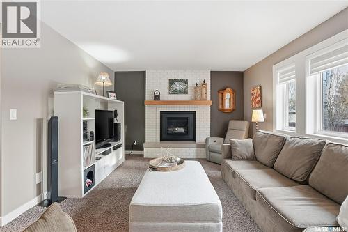 250 Emerald Terrace, Saskatoon, SK - Indoor Photo Showing Living Room With Fireplace