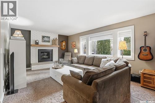 250 Emerald Terrace, Saskatoon, SK - Indoor Photo Showing Living Room With Fireplace