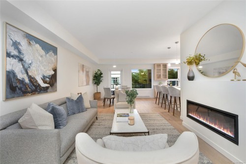 203-9716 Third St, Sidney, BC - Indoor Photo Showing Living Room With Fireplace