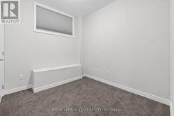 BEDROOM- BASEMENT - 