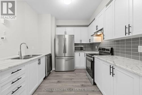 335 Catsfoot Walk, Ottawa, ON - Indoor Photo Showing Kitchen With Stainless Steel Kitchen With Double Sink With Upgraded Kitchen