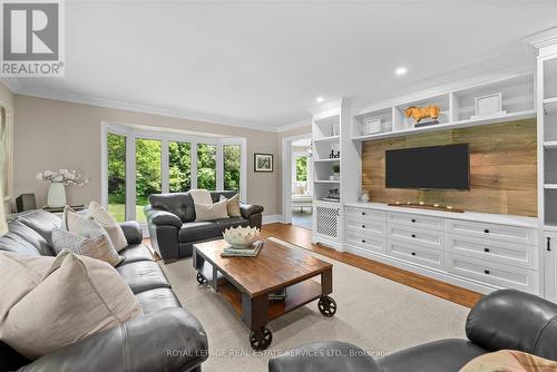 Family Room w/Double-Sided Wood Burning Fireplace - 2315 8 Sideroad, Burlington, ON - Indoor Photo Showing Living Room