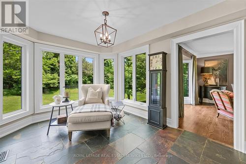 Sun Room Overlooking the Sprawling Grounds - 2315 8 Sideroad, Burlington, ON - Indoor Photo Showing Other Room