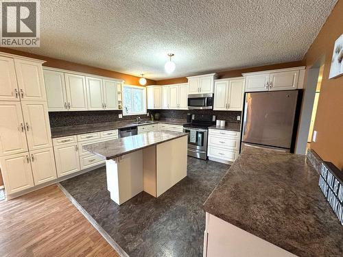 9016 98A Avenue, Fort St. John, BC - Indoor Photo Showing Kitchen With Double Sink