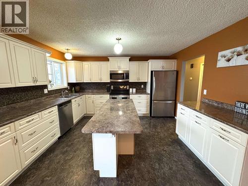 9016 98A Avenue, Fort St. John, BC - Indoor Photo Showing Kitchen With Double Sink