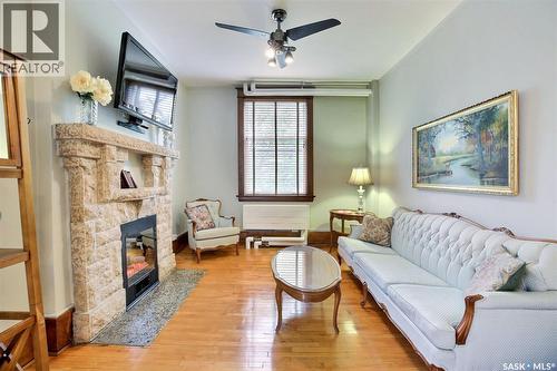 8 2201 14Th Avenue, Regina, SK - Indoor Photo Showing Living Room With Fireplace