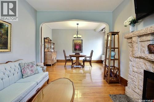 8 2201 14Th Avenue, Regina, SK - Indoor Photo Showing Living Room With Fireplace