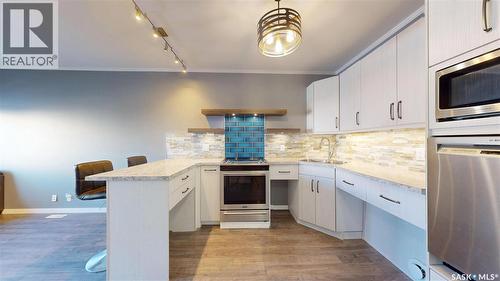 111 720 Baltzan Boulevard, Saskatoon, SK - Indoor Photo Showing Kitchen With Upgraded Kitchen
