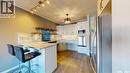 111 720 Baltzan Boulevard, Saskatoon, SK  - Indoor Photo Showing Kitchen With Stainless Steel Kitchen With Upgraded Kitchen 