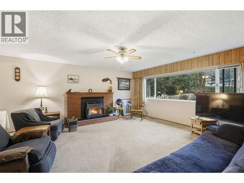 2480 Valleyview Drive, Kamloops, BC - Indoor Photo Showing Living Room With Fireplace
