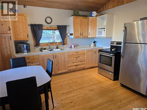 207 Pine Drive, Tobin Lake, SK - Indoor Photo Showing Kitchen With Double Sink