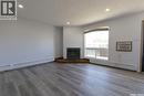 209 2931 Harding Street, Regina, SK  - Indoor Photo Showing Living Room With Fireplace 