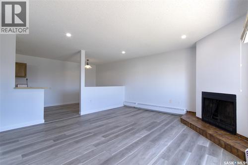 209 2931 Harding Street, Regina, SK - Indoor With Fireplace