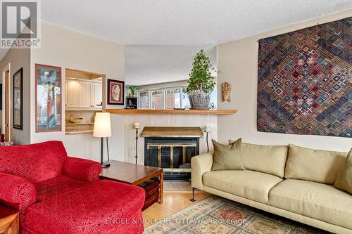 103 - 555 Wilbrod Street, Ottawa, ON - Indoor Photo Showing Living Room With Fireplace