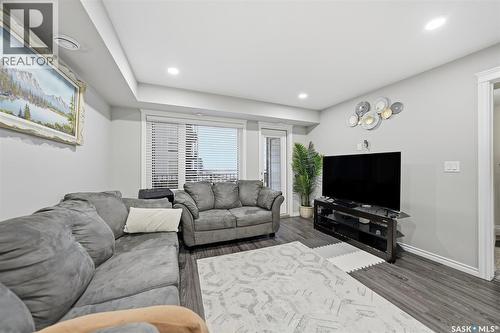 213 110 Akhtar Bend, Saskatoon, SK - Indoor Photo Showing Living Room